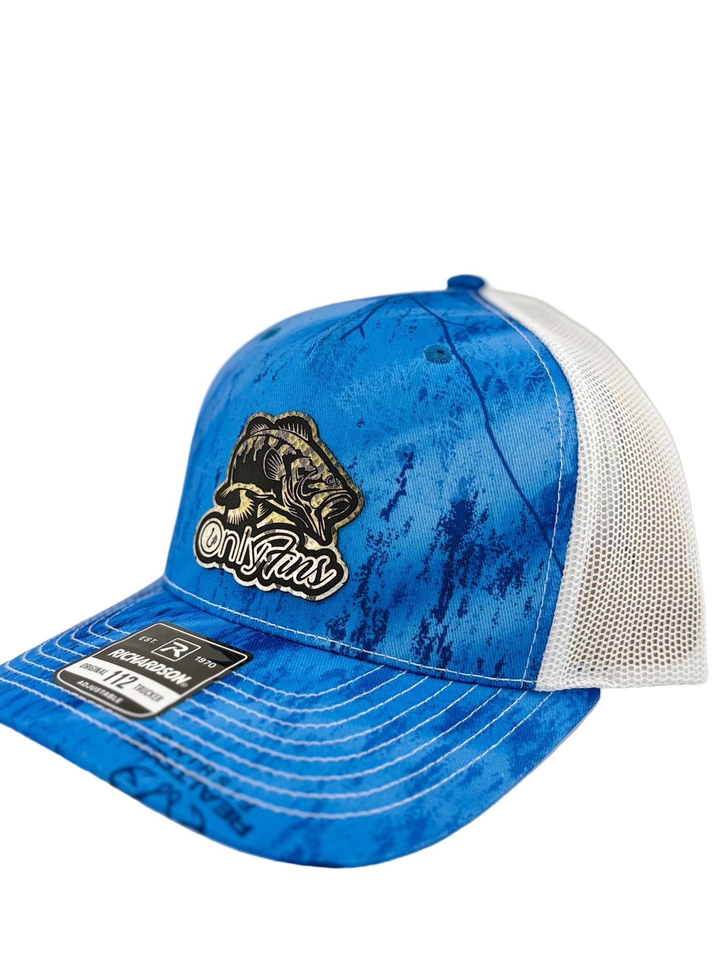 A blue and white Richardson 112 trucker hat with a water-textured pattern and a black and gold patch featuring a largemouth bass and the phrase "OnlyFins." The front panel is structured with a white mesh back.